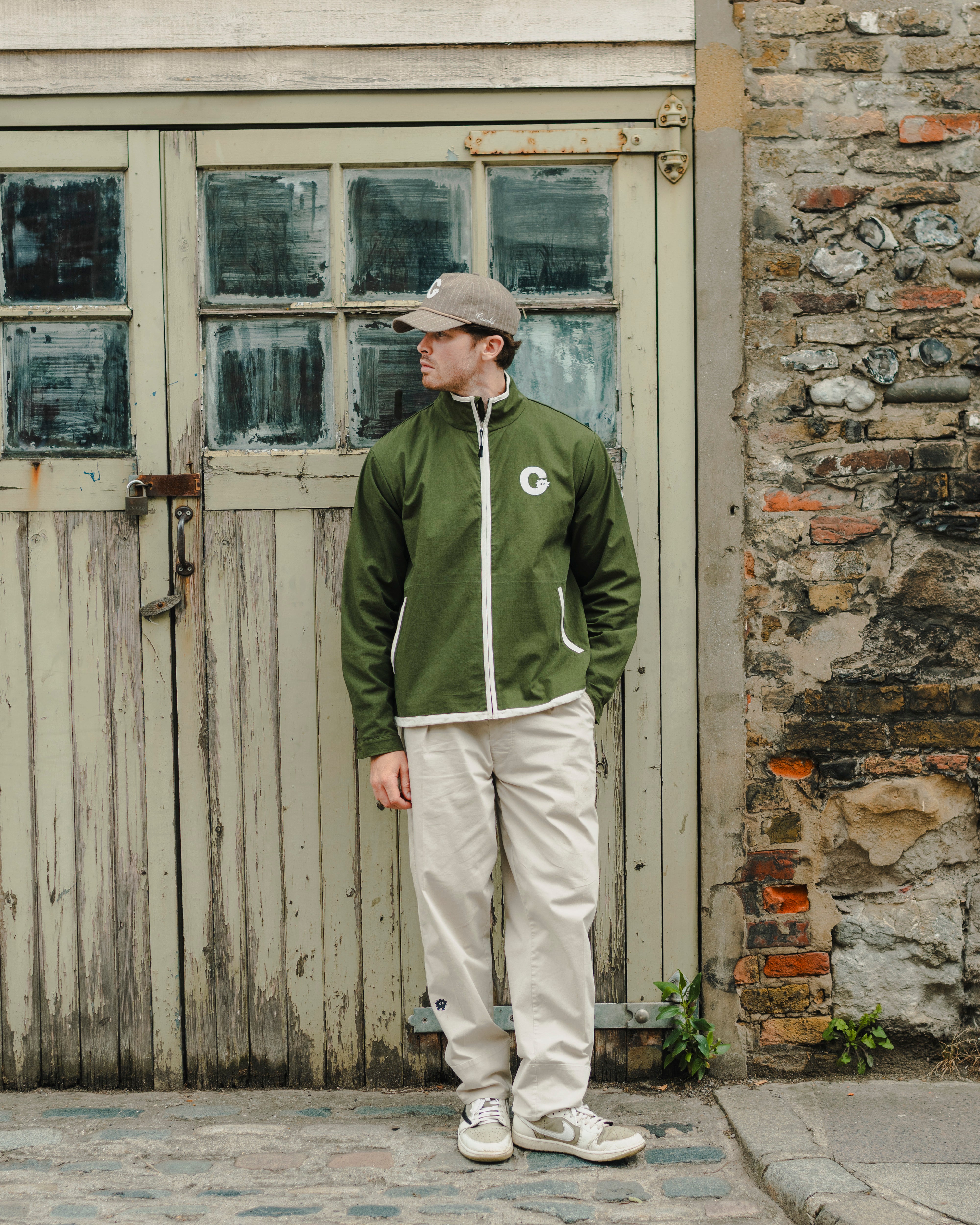 Casualist Cart Path Ripstop Jacket worn on course lifestyle