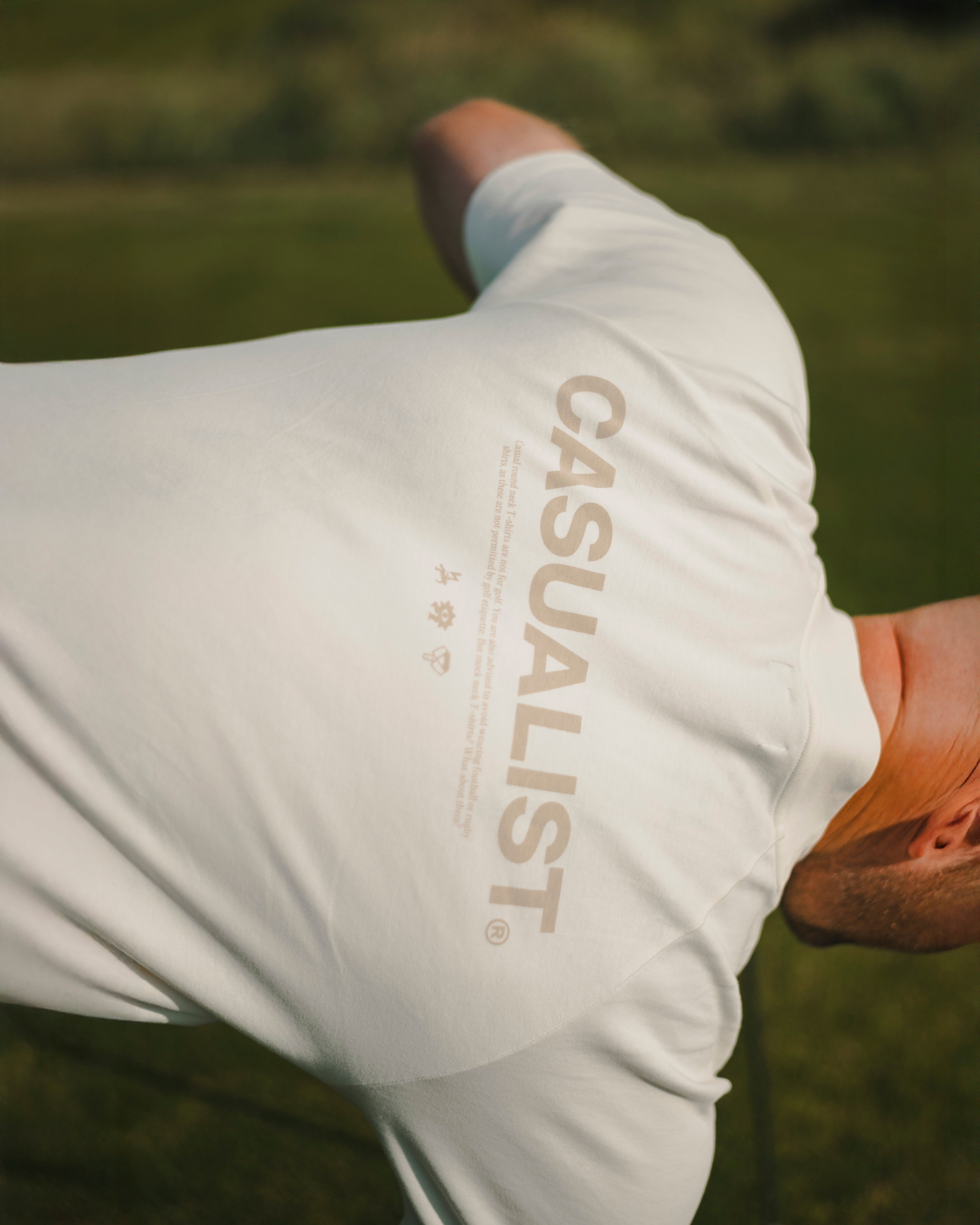 ppropriate Dress Code Mockneck Tee worn on course Casualist